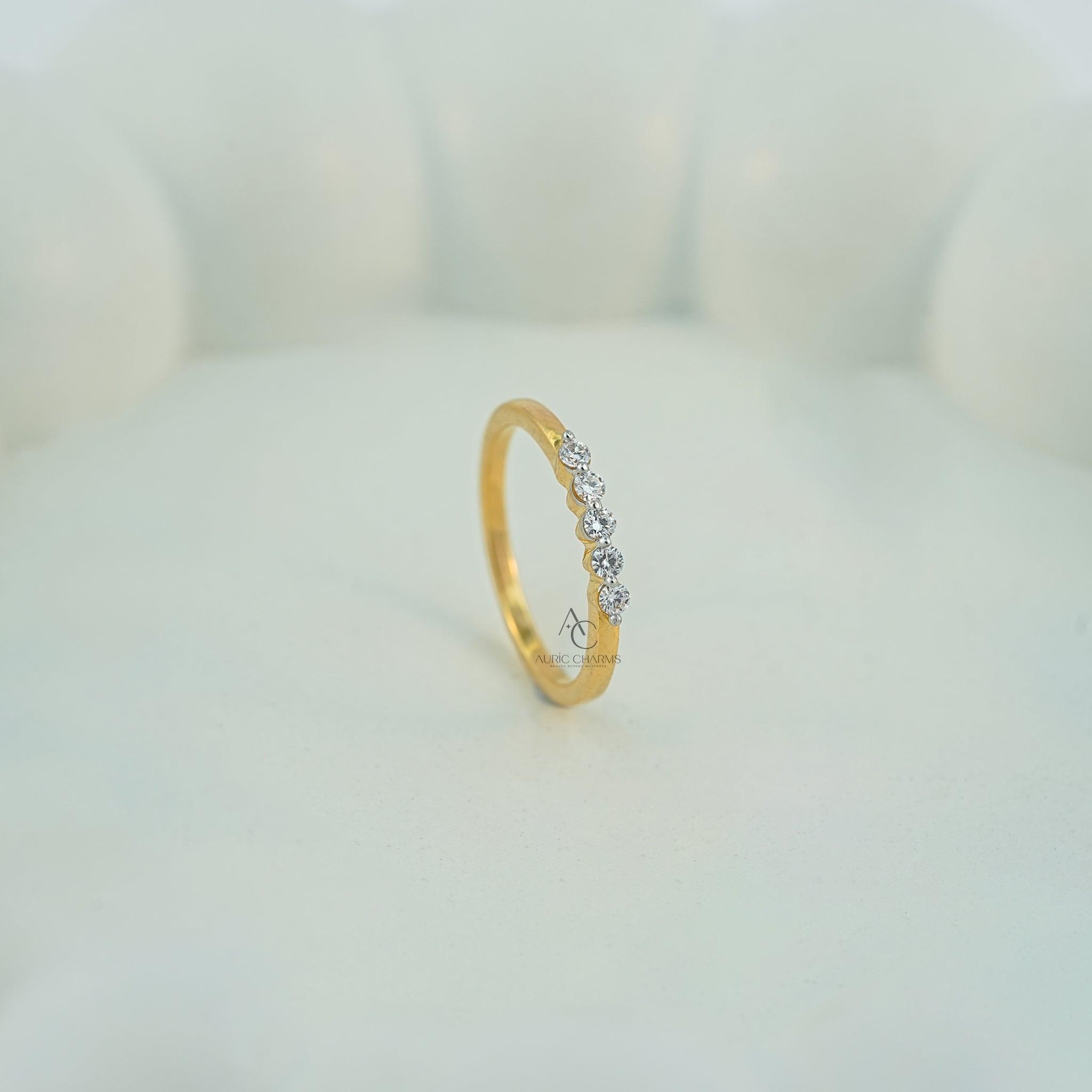 Elegant gold band ring with sparkling diamonds, perfect for sophisticated everyday wear.