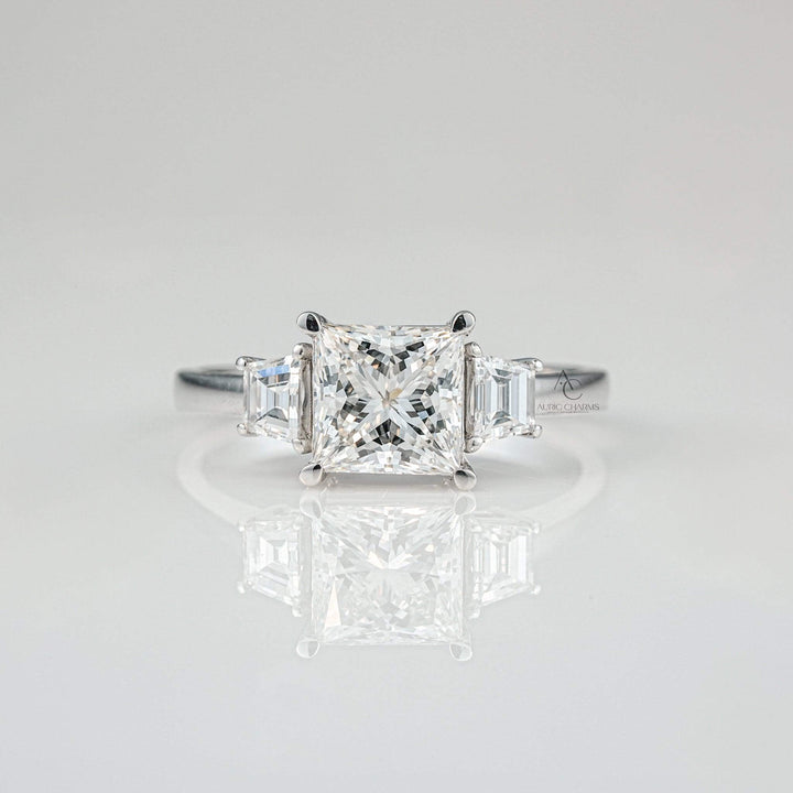 Princess-cut lab-grown diamond ring with side baguette diamonds in platinum setting