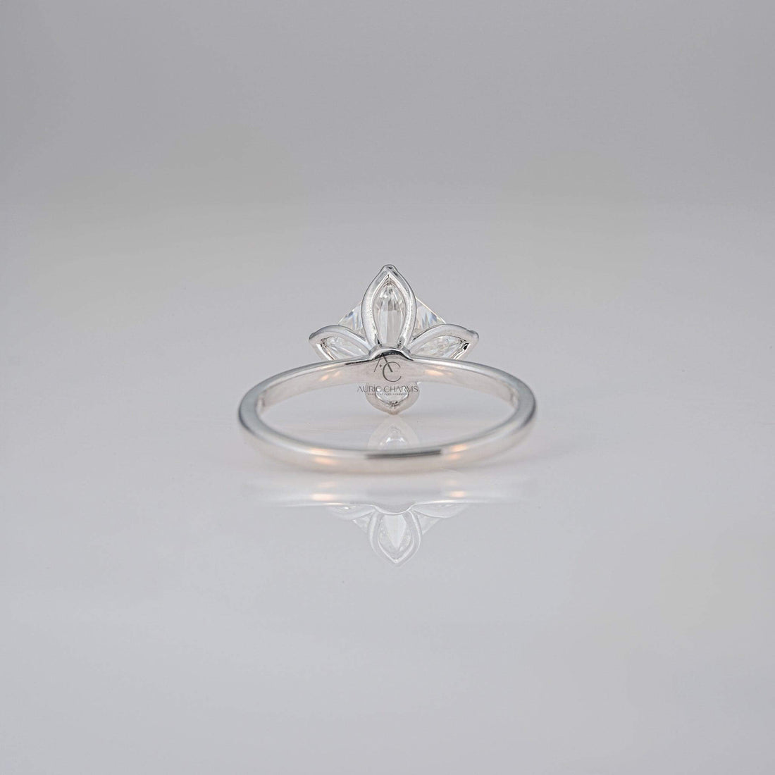 Detailed back view of square diamond ring showcasing unique floral prong setting.