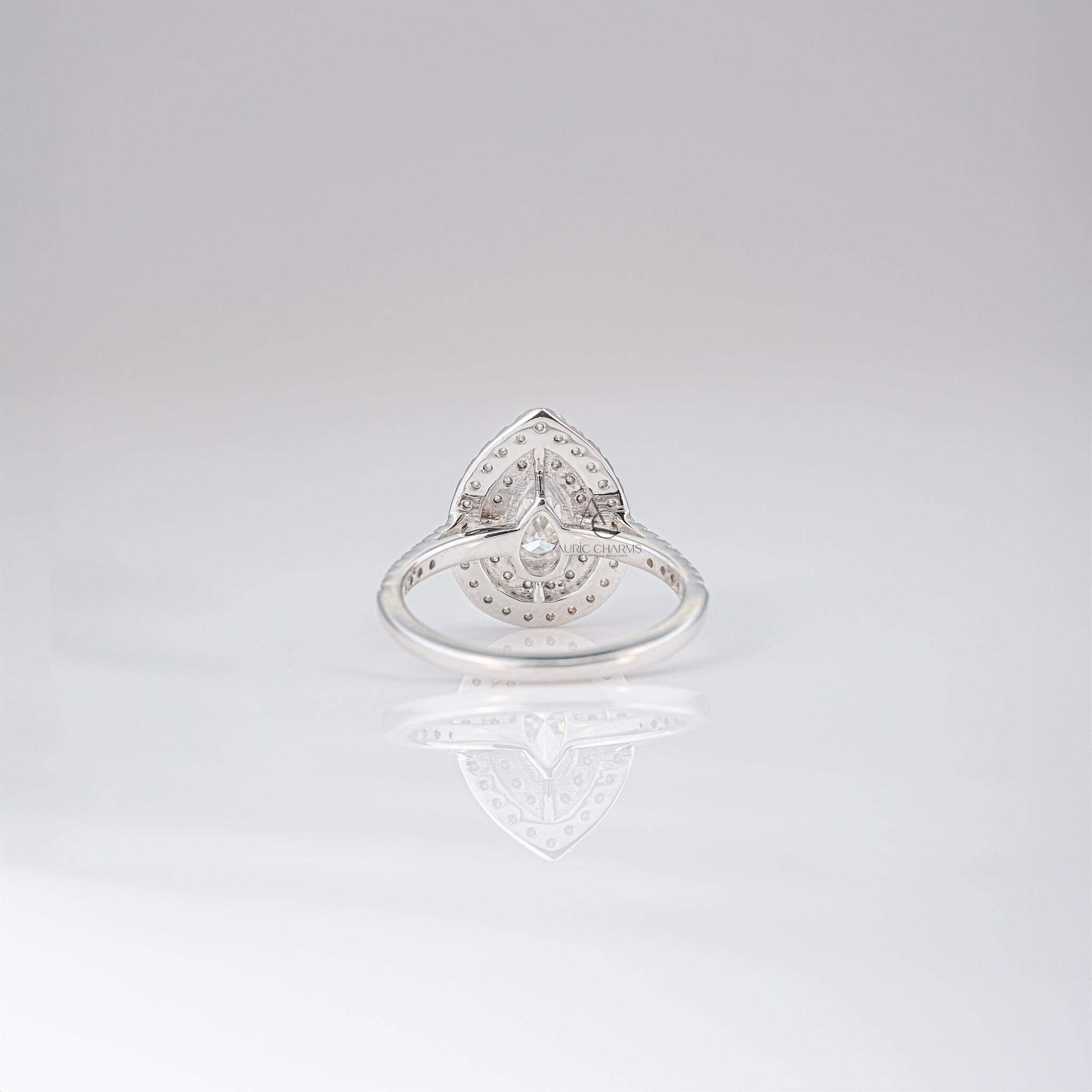 Rear view of a pear-shaped diamond ring showing intricate double halo craftsmanship.