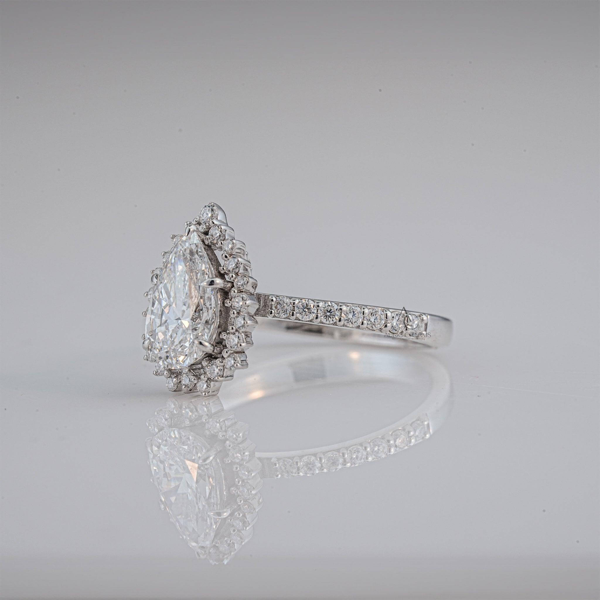Profile of pear-shaped halo lab-grown diamond ring showcasing intricate pave band craftsmanship