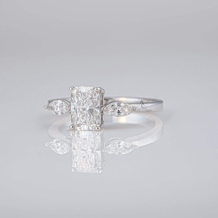 Radiant cut diamond lab-grown engagement ring with marquise side stones, highlighting its brilliance and eco-friendly appeal.