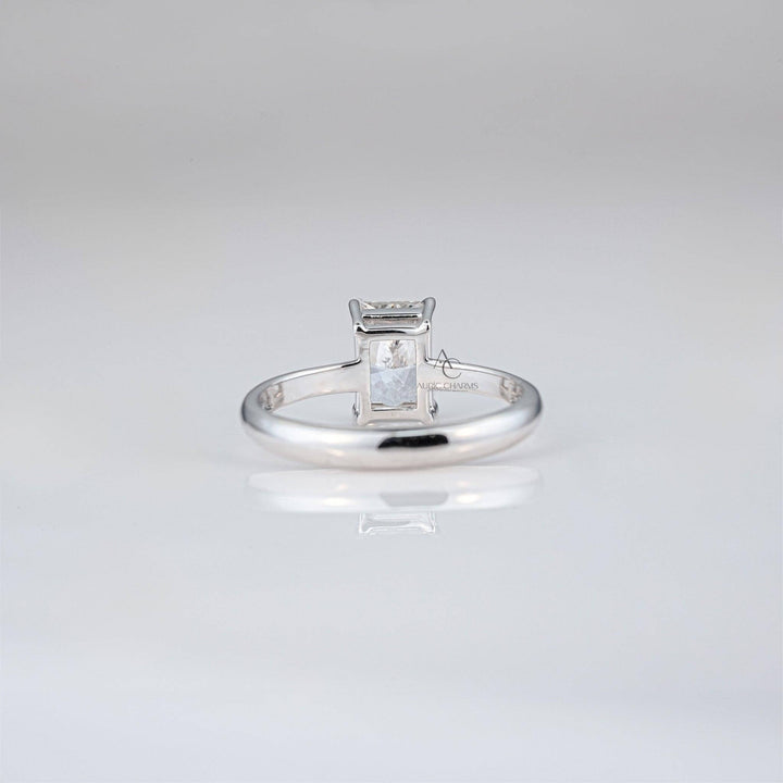 Rear view of radiant-cut diamond ring showcasing minimalistic band and secure setting.
