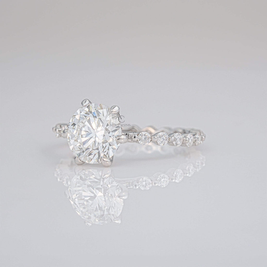 Side view of round lab-grown diamond ring showcasing elegant prong setting.