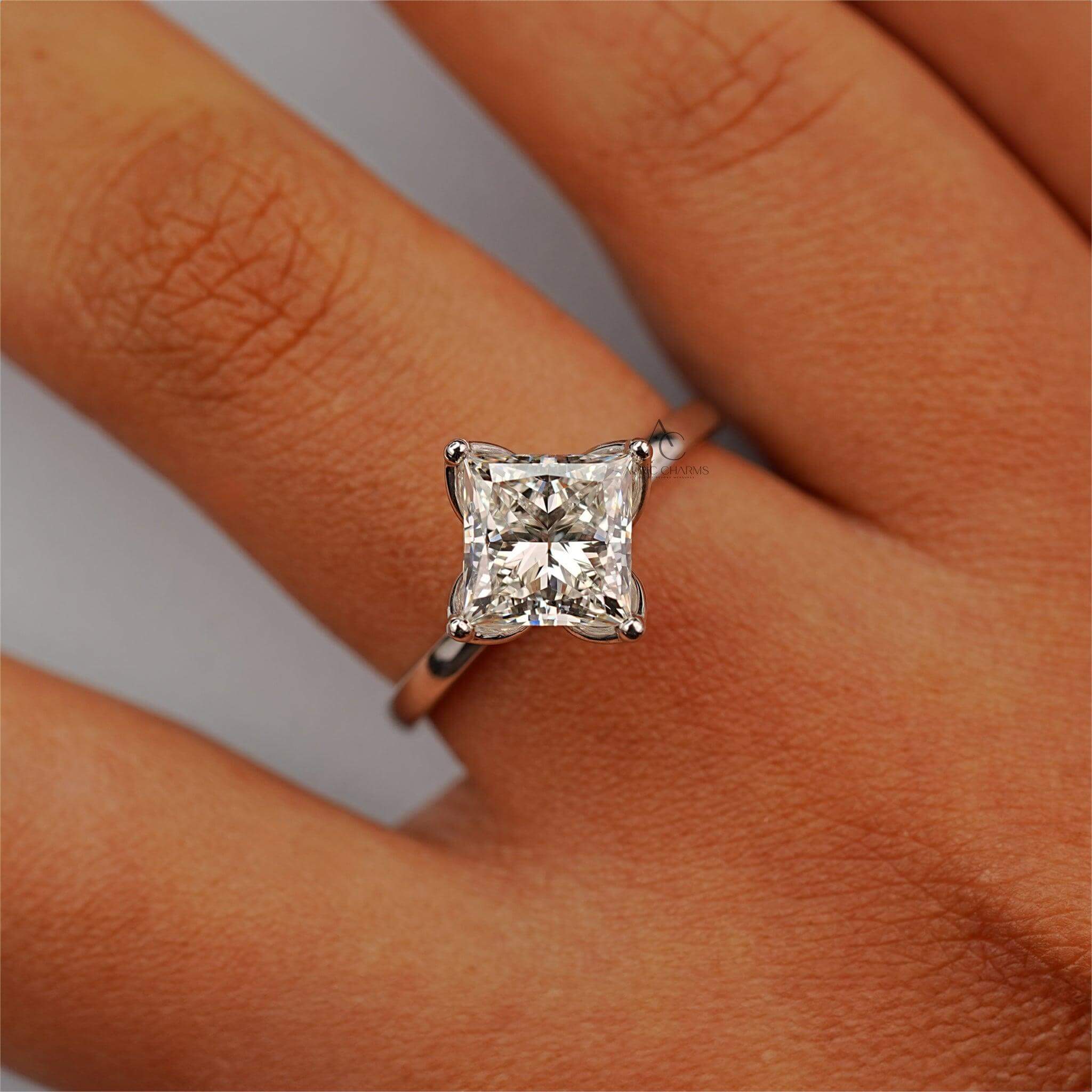 Square-cut lab-created diamond ring on hand, perfect for modern elegance.