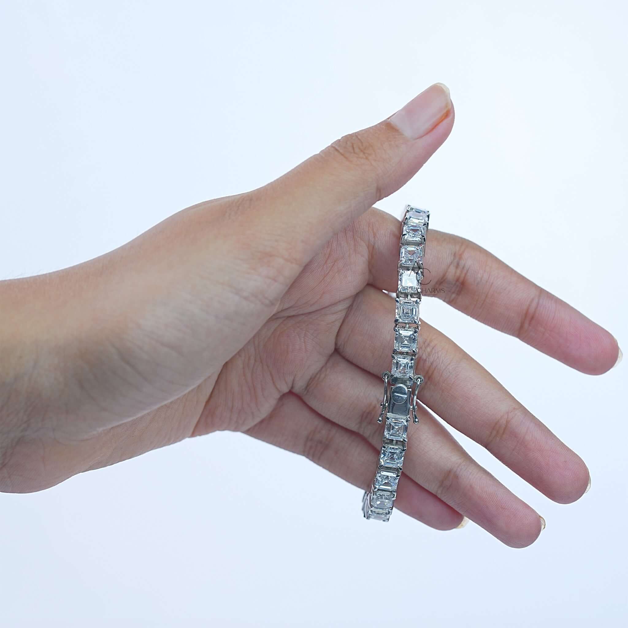Side view of lab-grown diamond tennis bracelet with prong-set princess-cut diamonds.