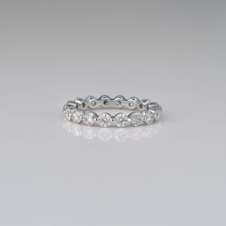 Eternity band with round lab-grown diamonds in white gold.