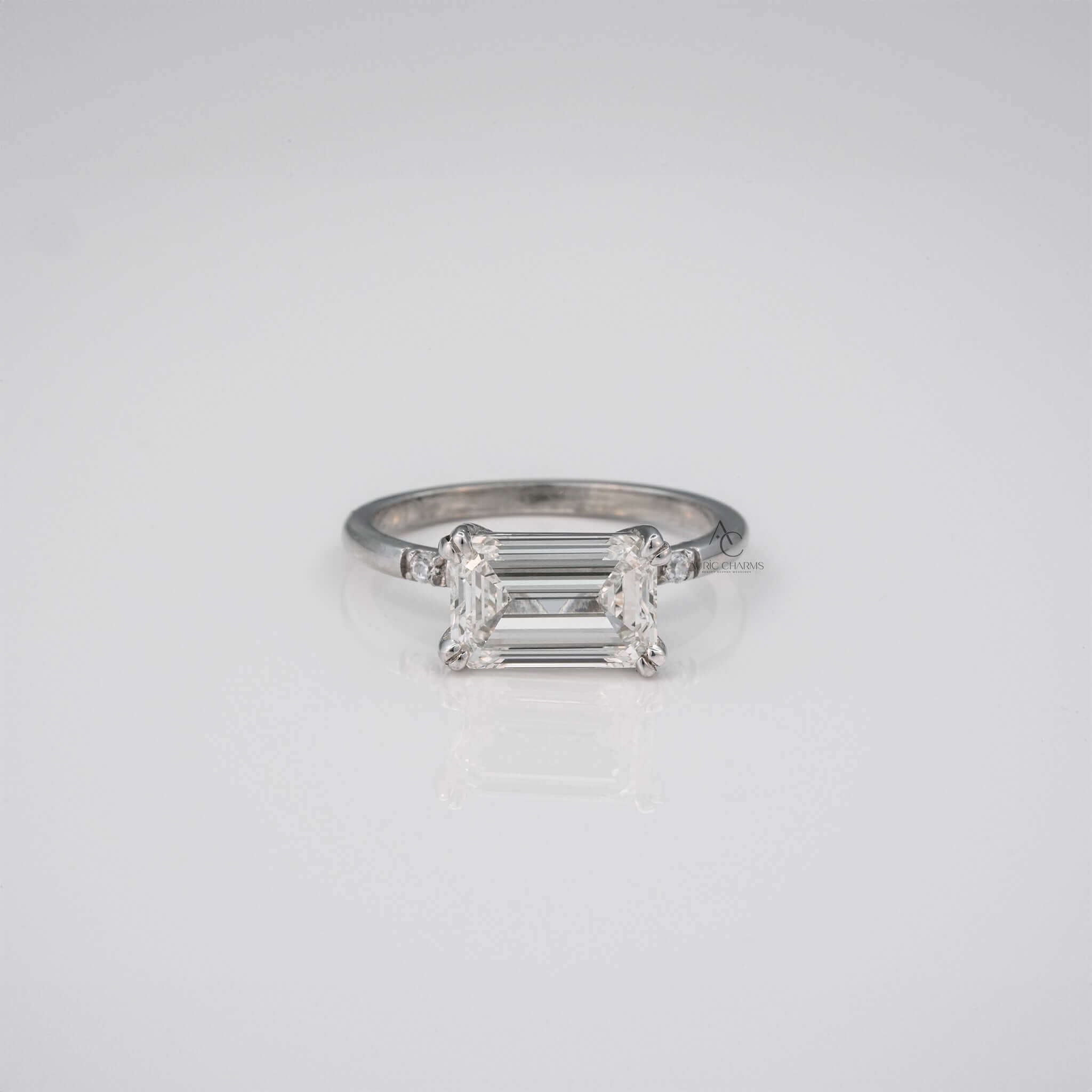 Elara Emerald Three-Stone Diamond Engagement Ring