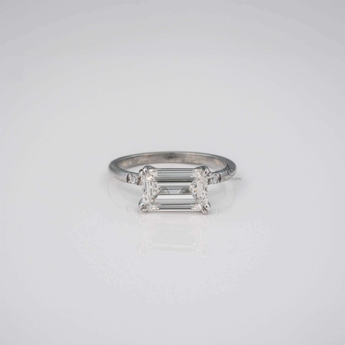 Elara Emerald Three-Stone Diamond Engagement Ring