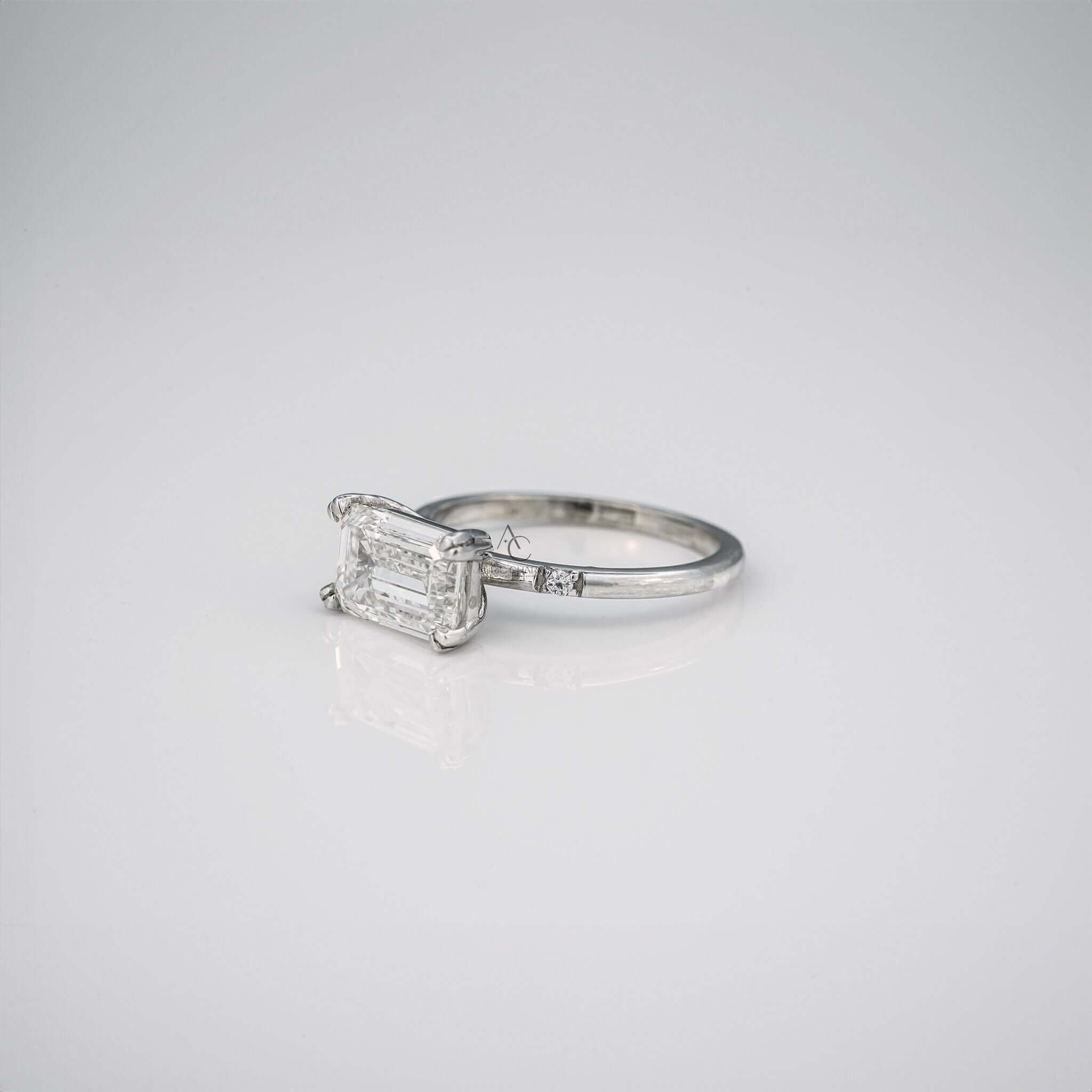 Elara Emerald Three-Stone Diamond Engagement Ring