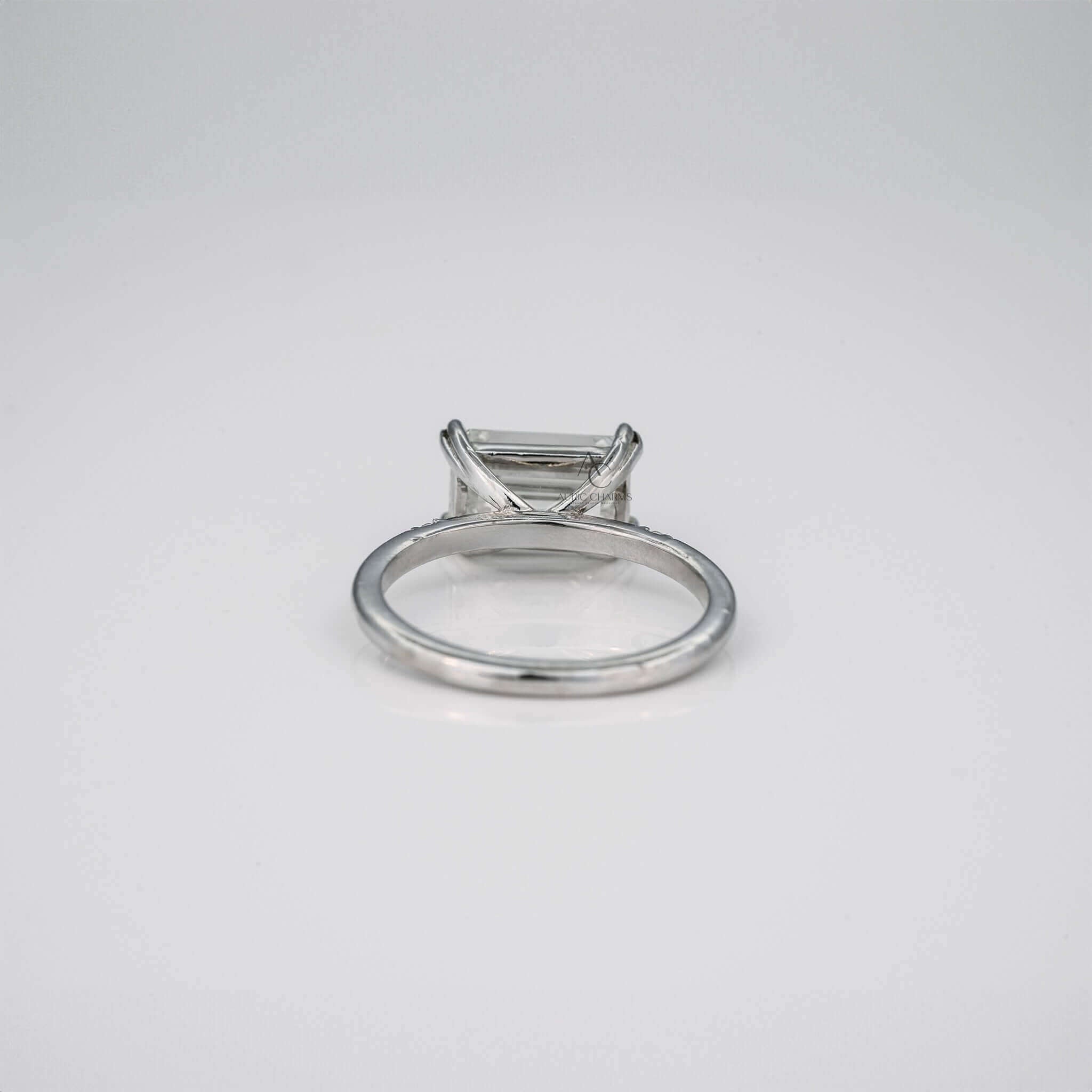 Elara Emerald Three-Stone Diamond Engagement Ring