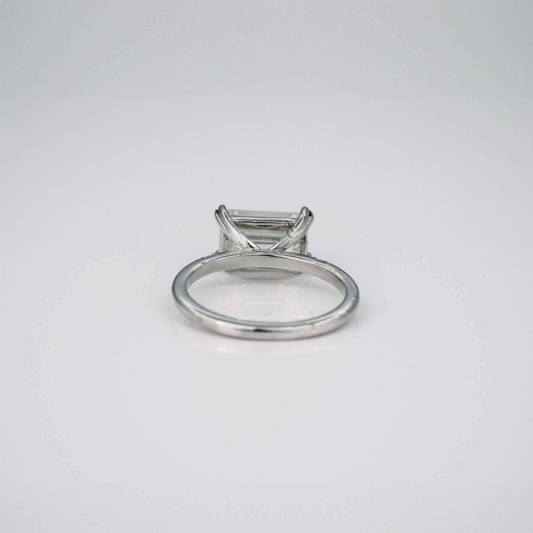 Elara Emerald Three-Stone Diamond Engagement Ring