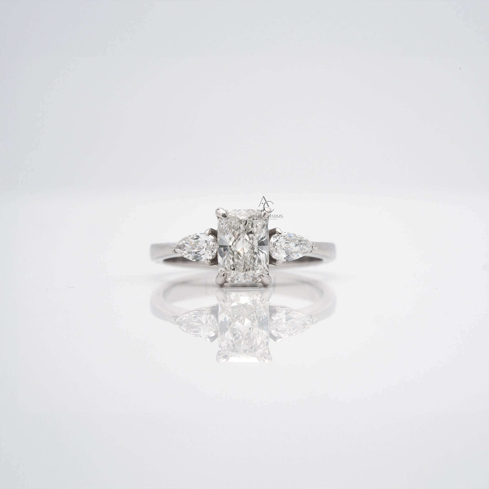 Elara Radiant & Pear Three-Stone Diamond Ring