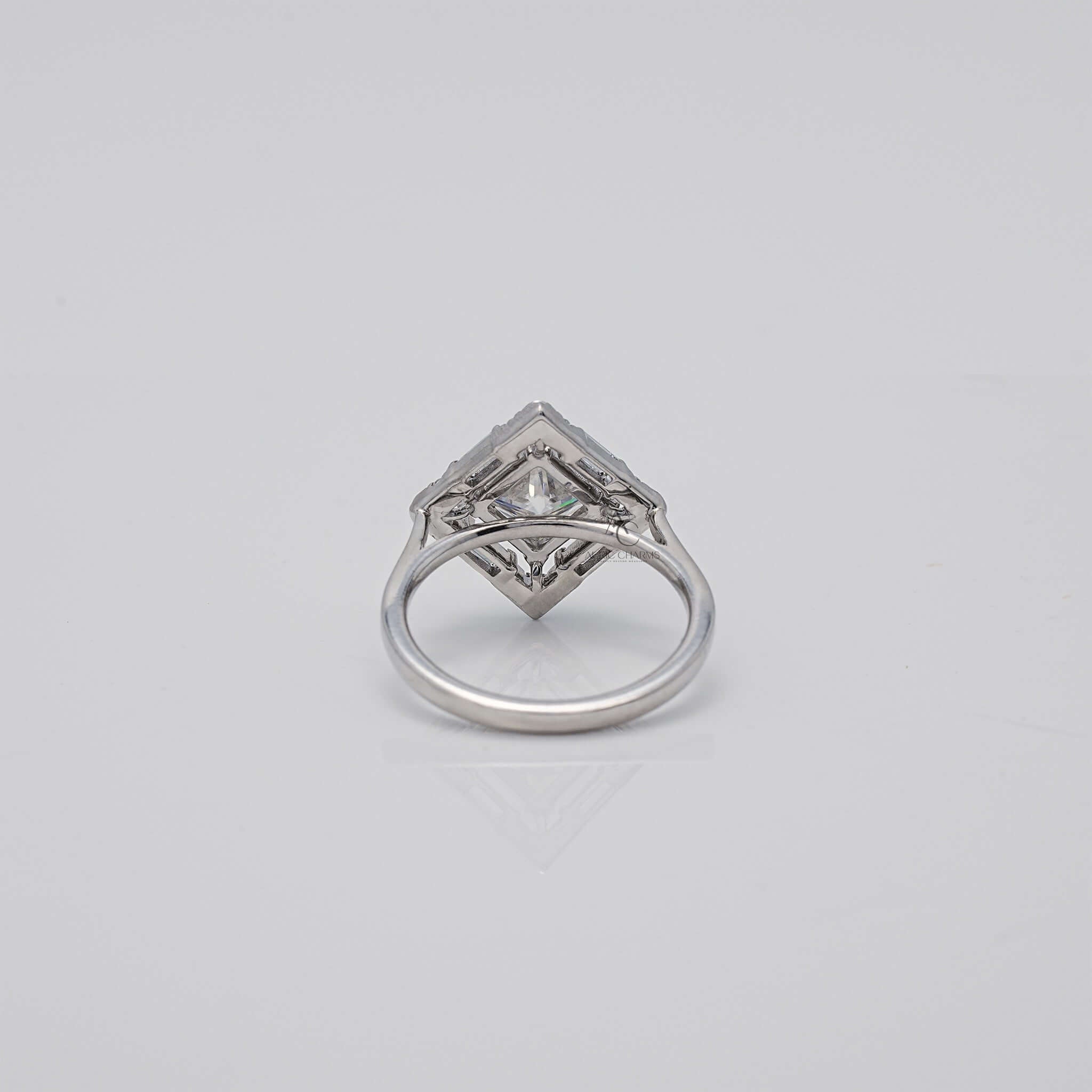 Rear view of square diamond ring showcasing halo design.