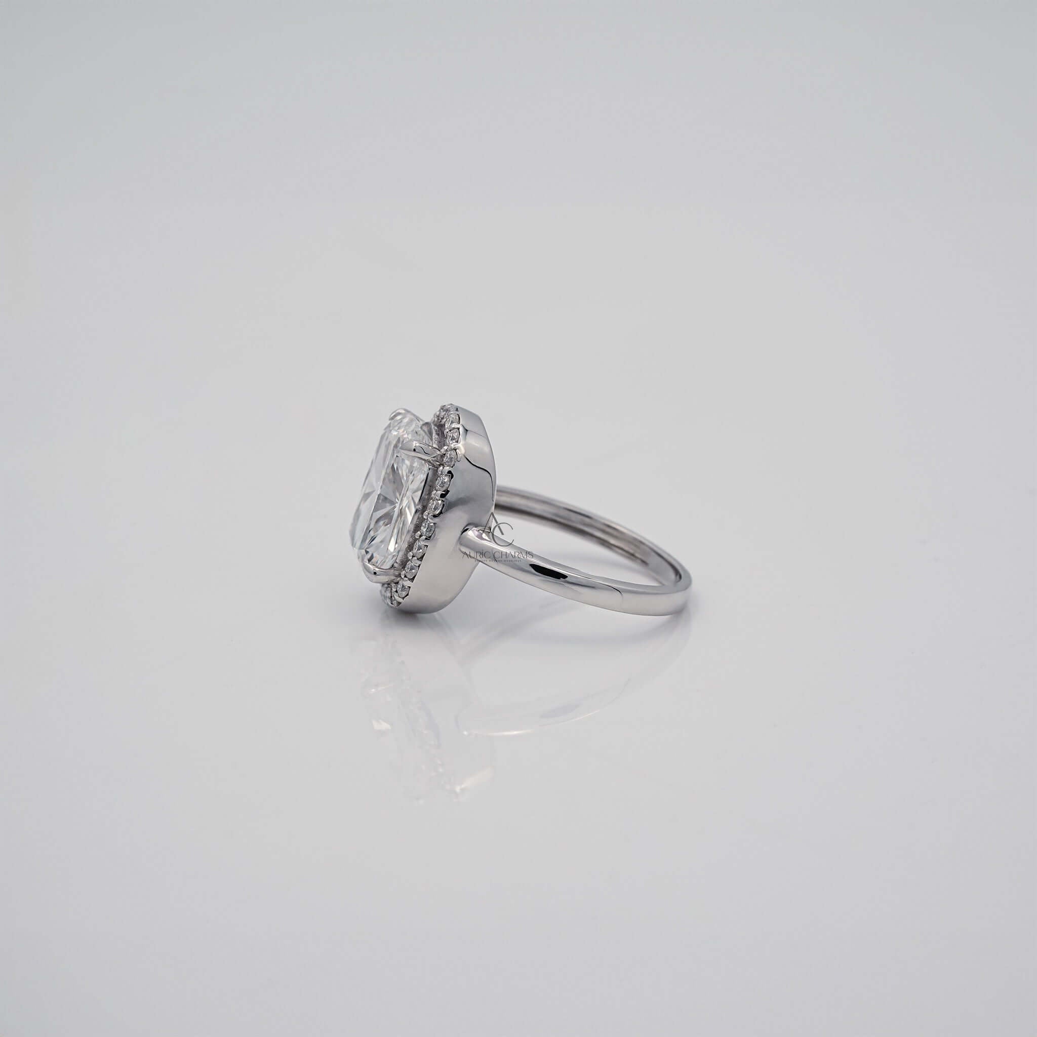 Side profile of cushion-cut diamond ring showing the band.