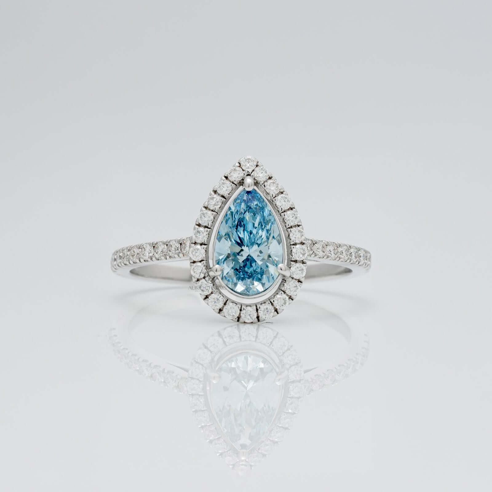 Oceanica Blue Pear Halo Engagement Ring
