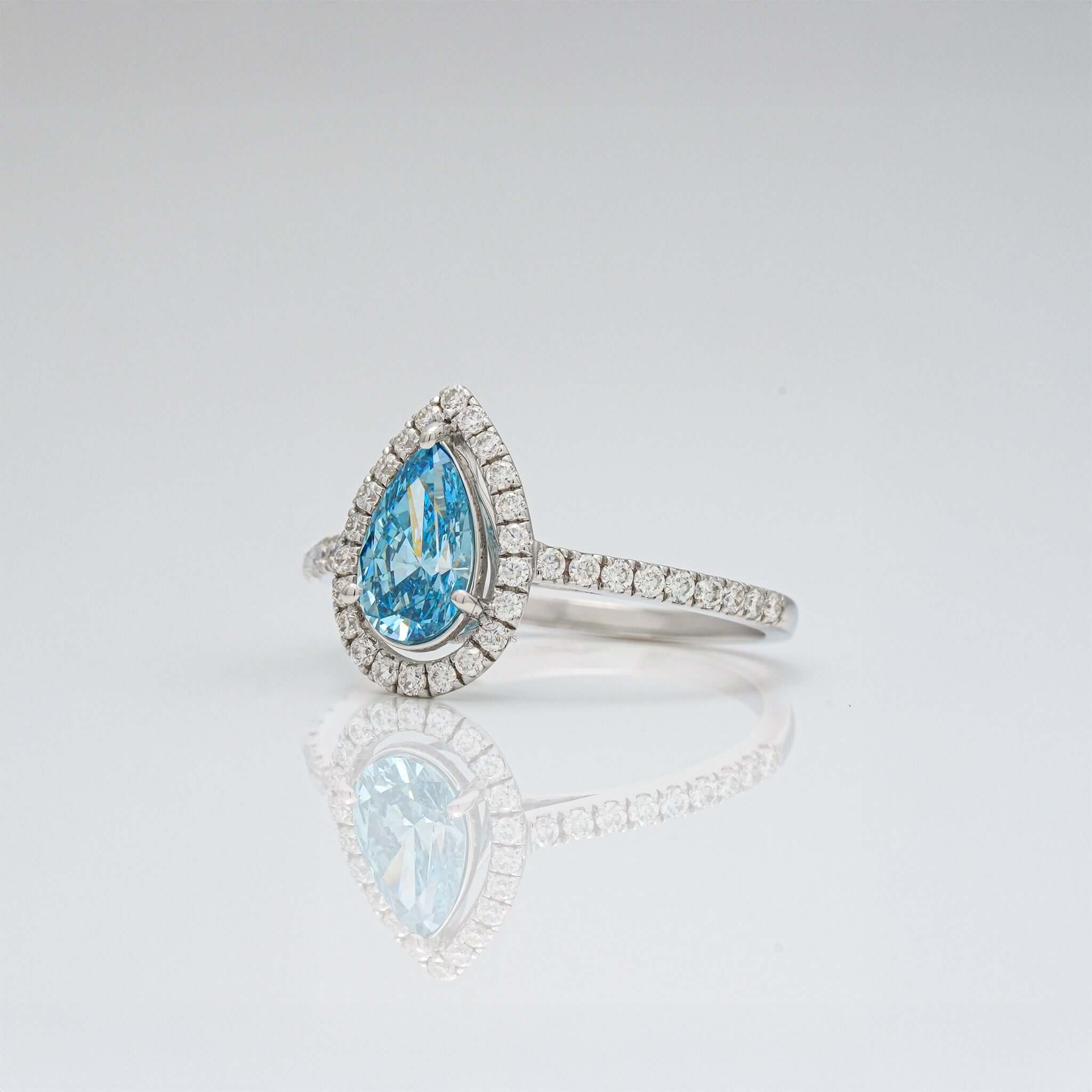 Oceanica Blue Pear Halo Engagement Ring