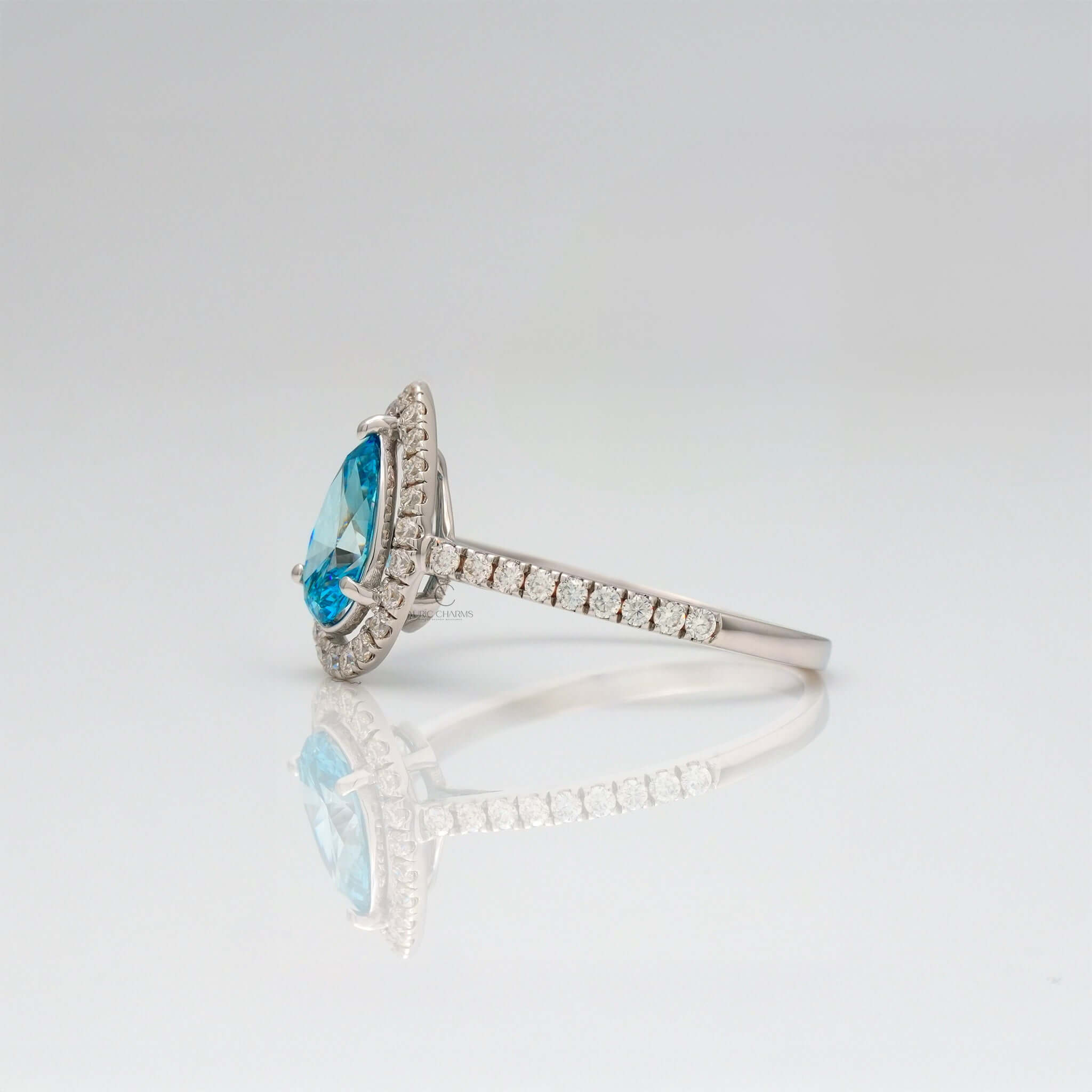 Oceanica Blue Pear Halo Engagement Ring