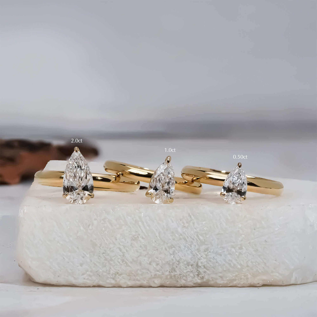 Lyra Pear Cut Solitaire Diamond Ring