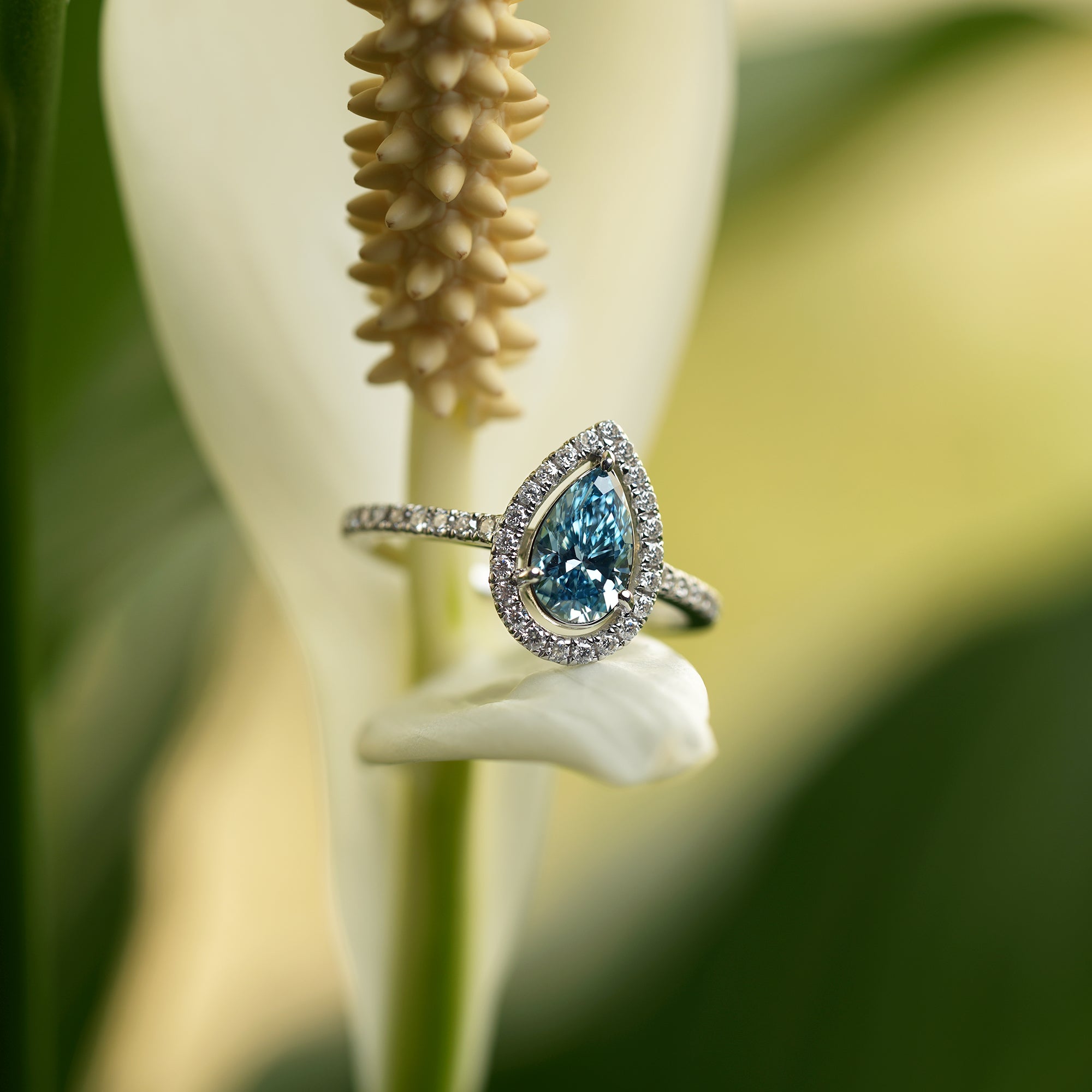 Oceanica Blue Pear Halo Engagement Ring