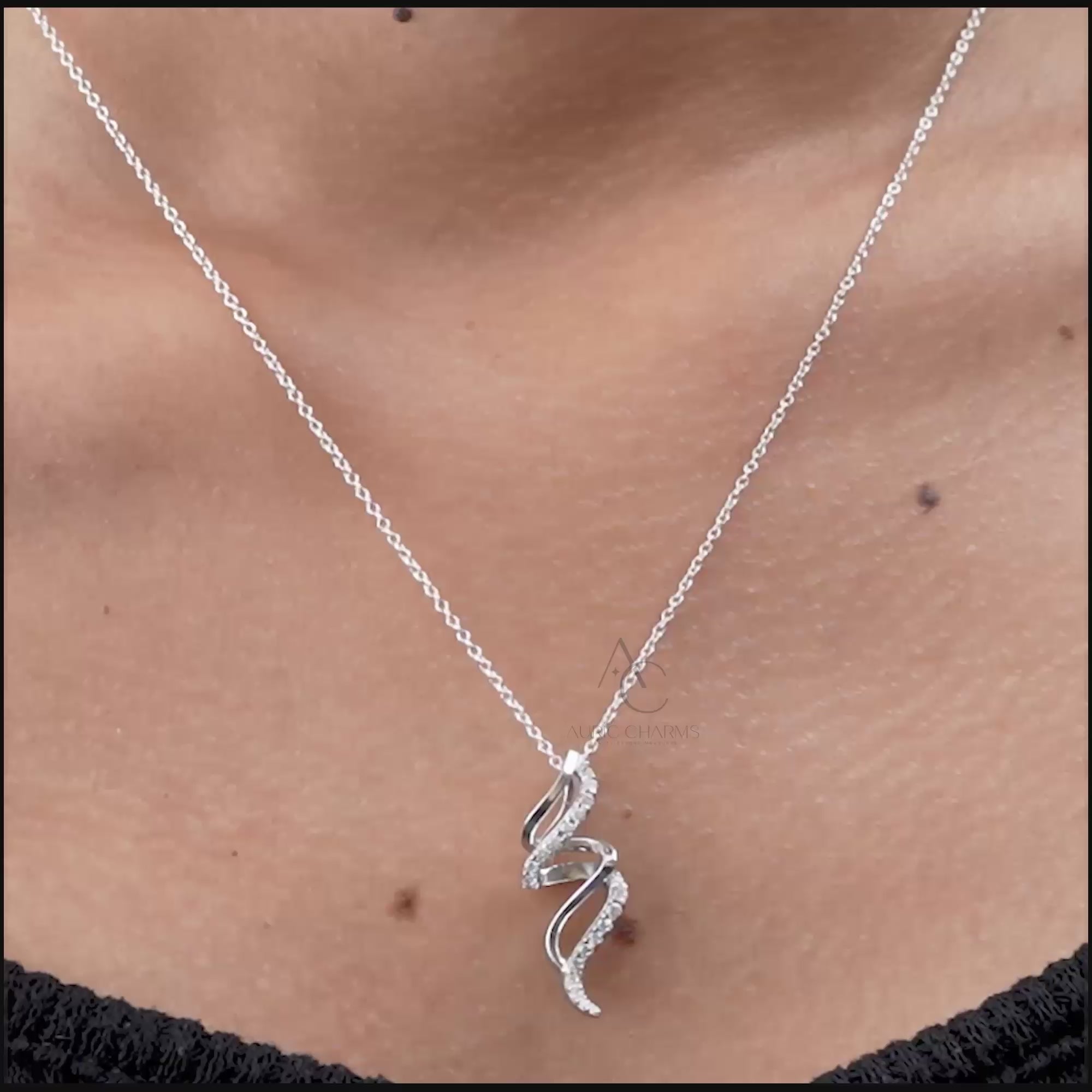 Elegant lab-grown diamond spiral pendant necklace worn on neck, symbolizing luxury and sustainable jewelry.