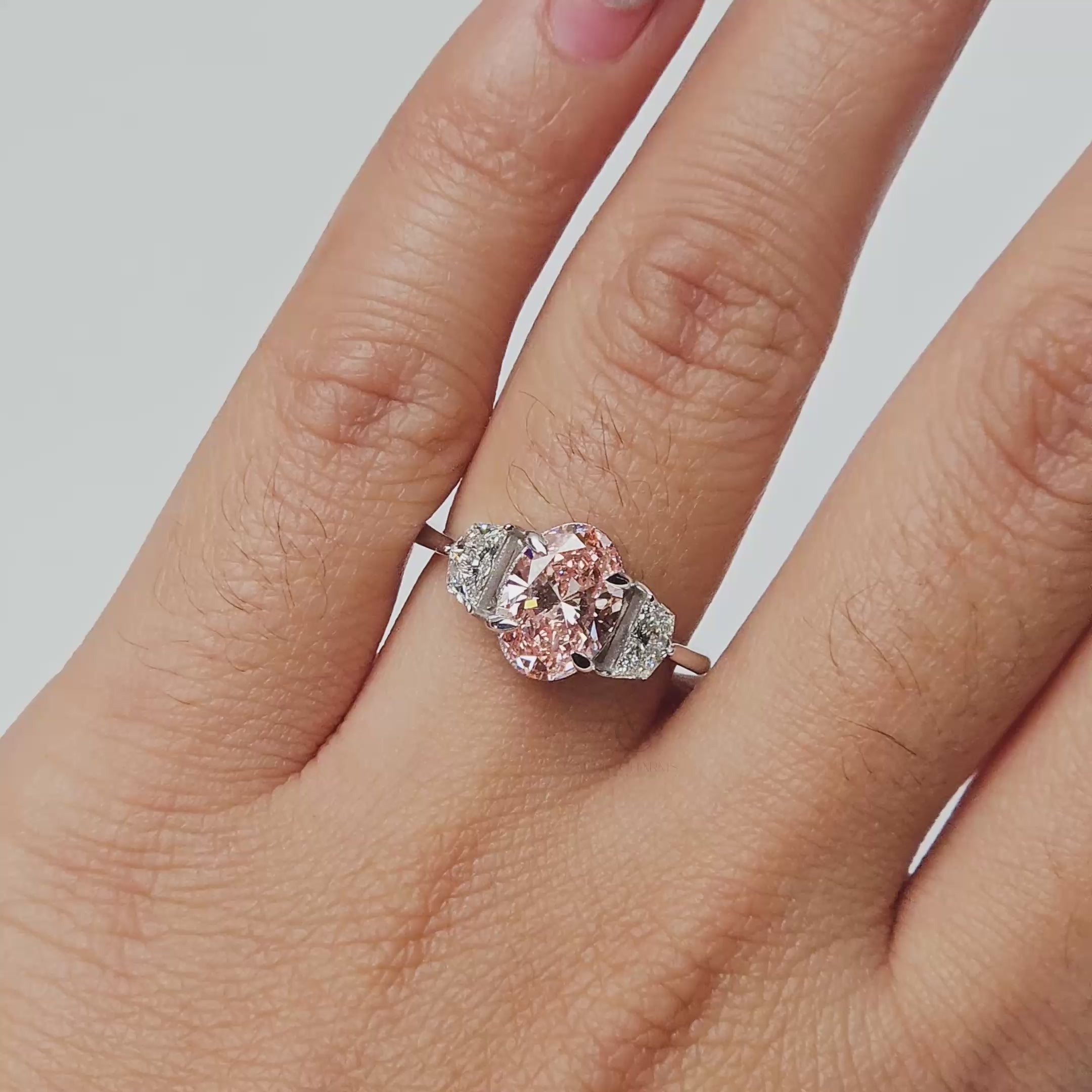 Fancy Pink Oval Three-Stone Ring