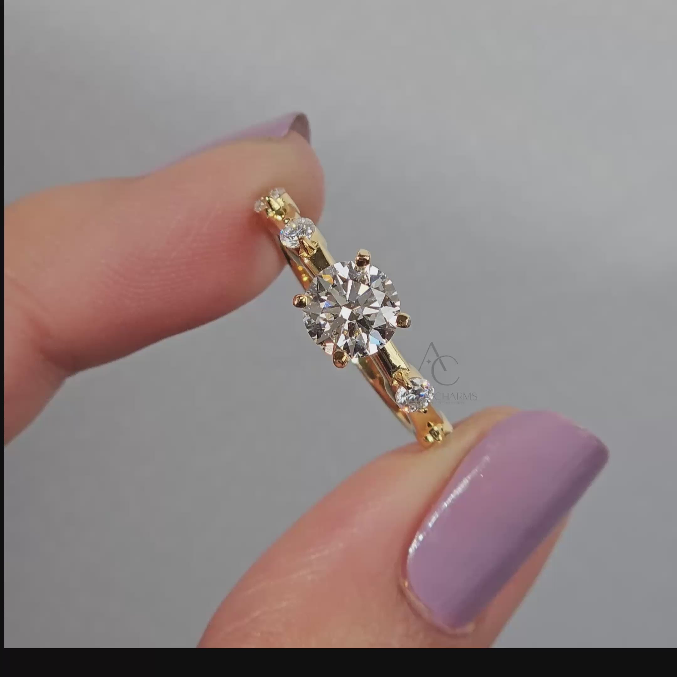 detailed view of a diamond solitaire ring with smooth white gold 