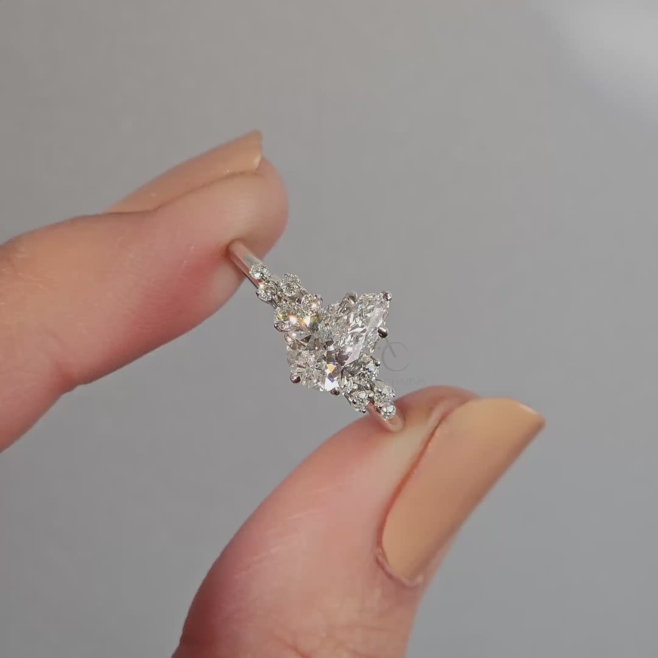 Elaria Pear Cut Diamond Ring with Side Accents