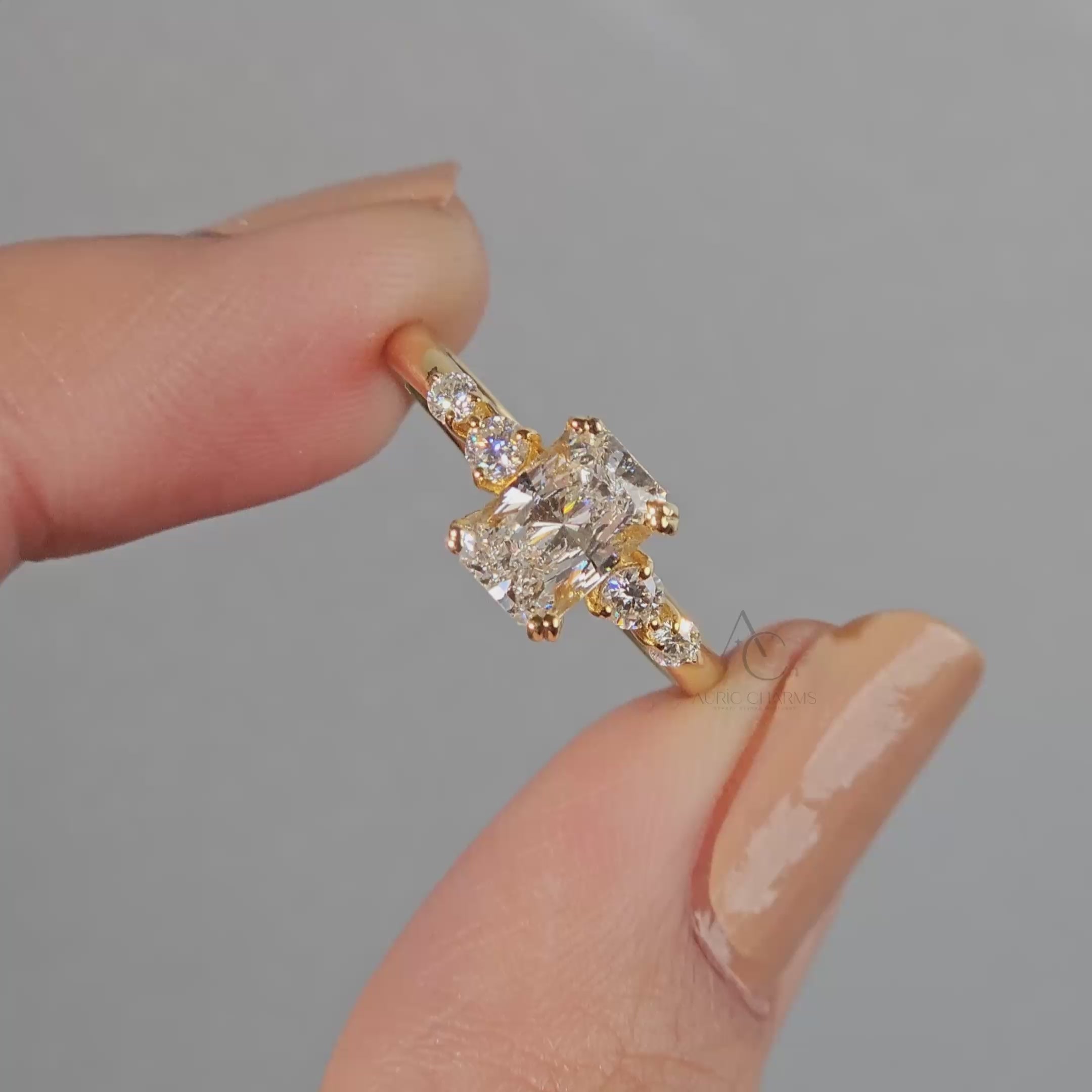 360° view of a radiant-cut diamond engagement ring with side stones in white gold.