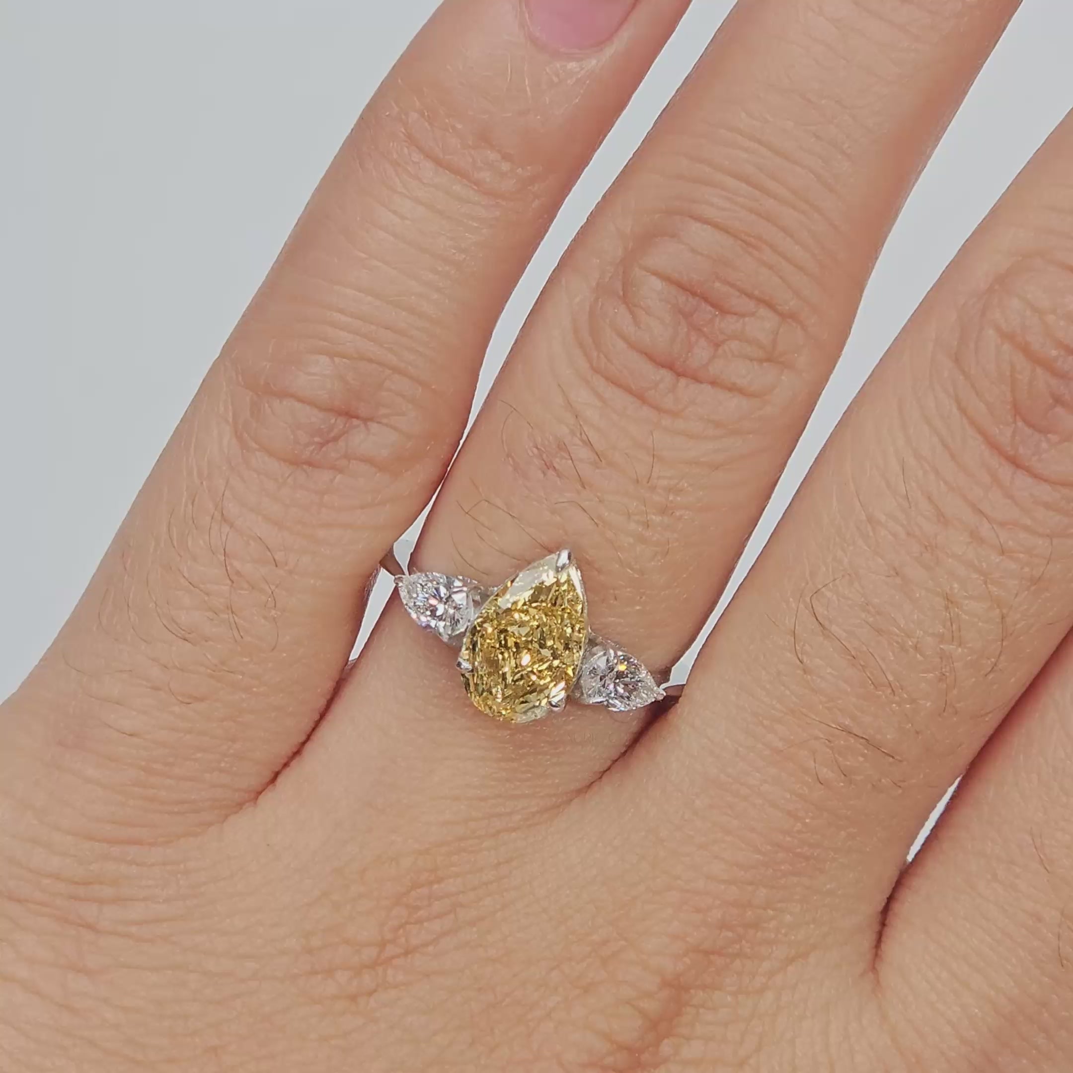 Fancy Yellow Pear Three-Stone Ring