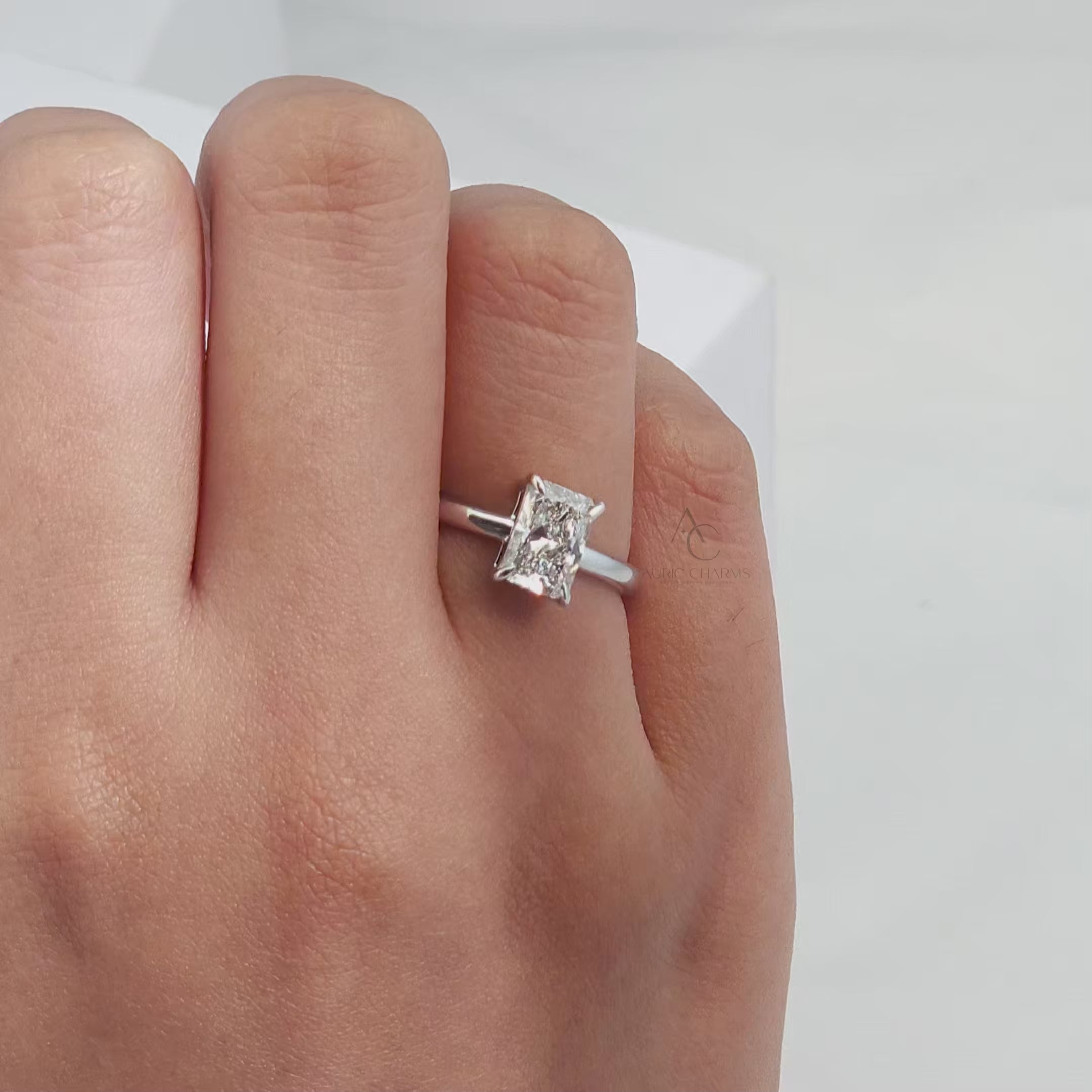 Radiant-cut diamond solitaire ring video showcasing brilliance and premium craftsmanship.