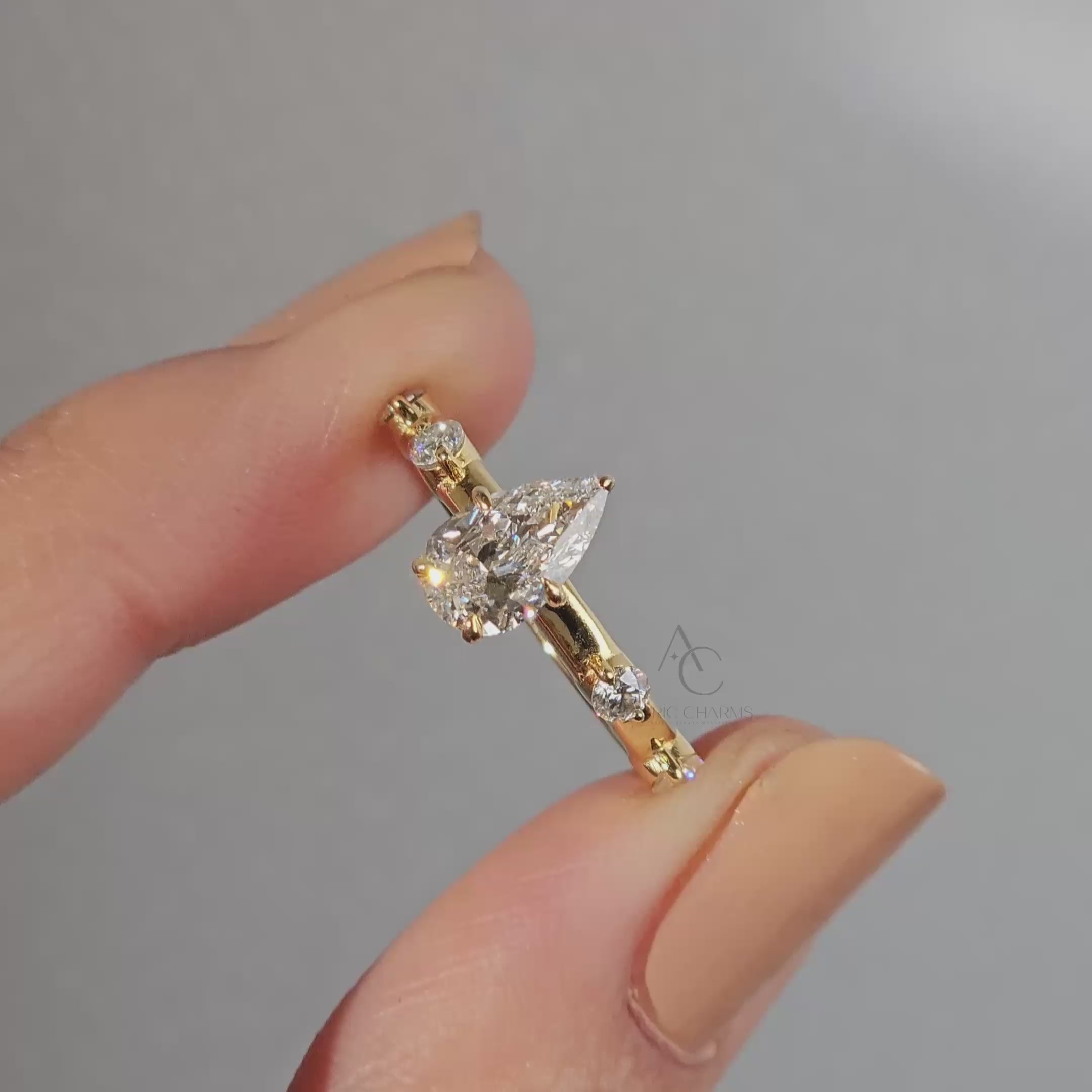 Detailed showcase of a pear-cut lab-grown diamond engagement ring, highlighting sustainability and timeless style.