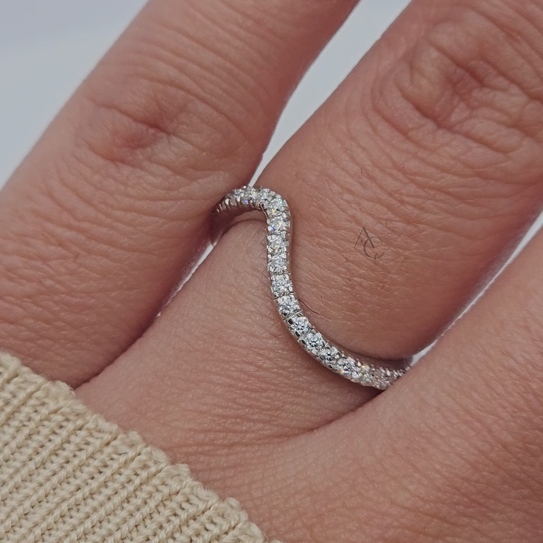 Wavy diamond band in white gold with full 360-degree rotating view.