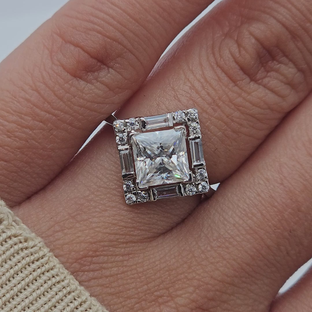 Video of square-cut diamond halo ring from various angles.