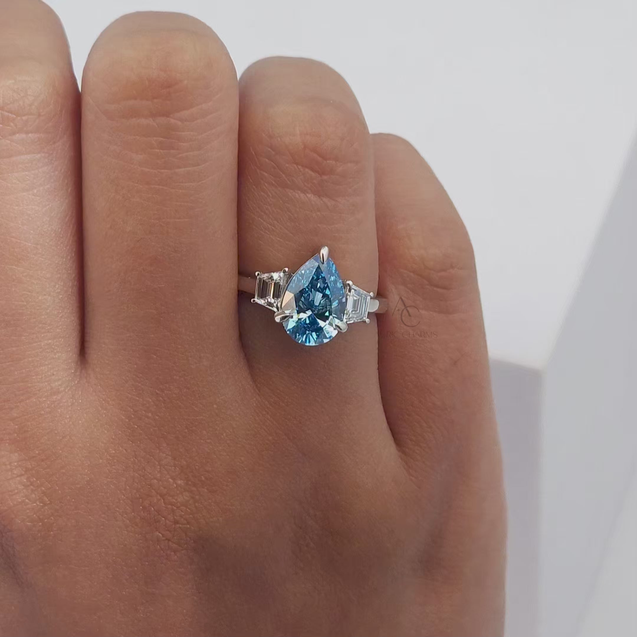 Fancy Vivid Blue Pear Diamond Engagement Ring with Side Stones