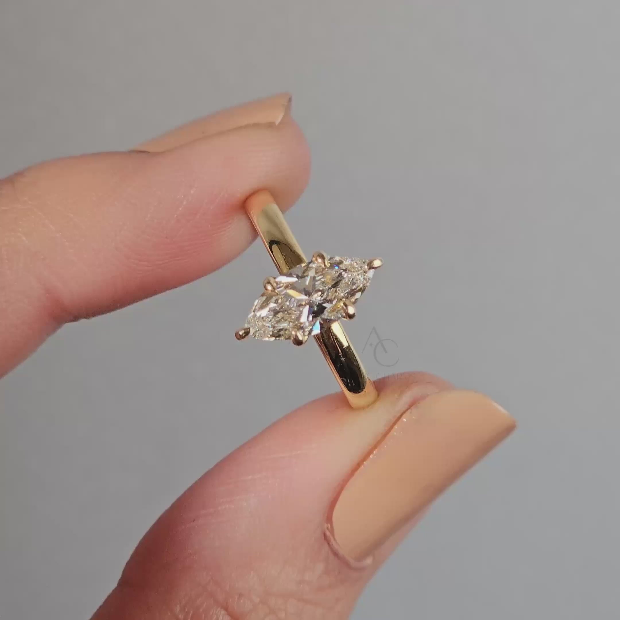 detailed view of the marquise-cut diamond solitaire ring emphasizing the supportive setting and smooth band finish.