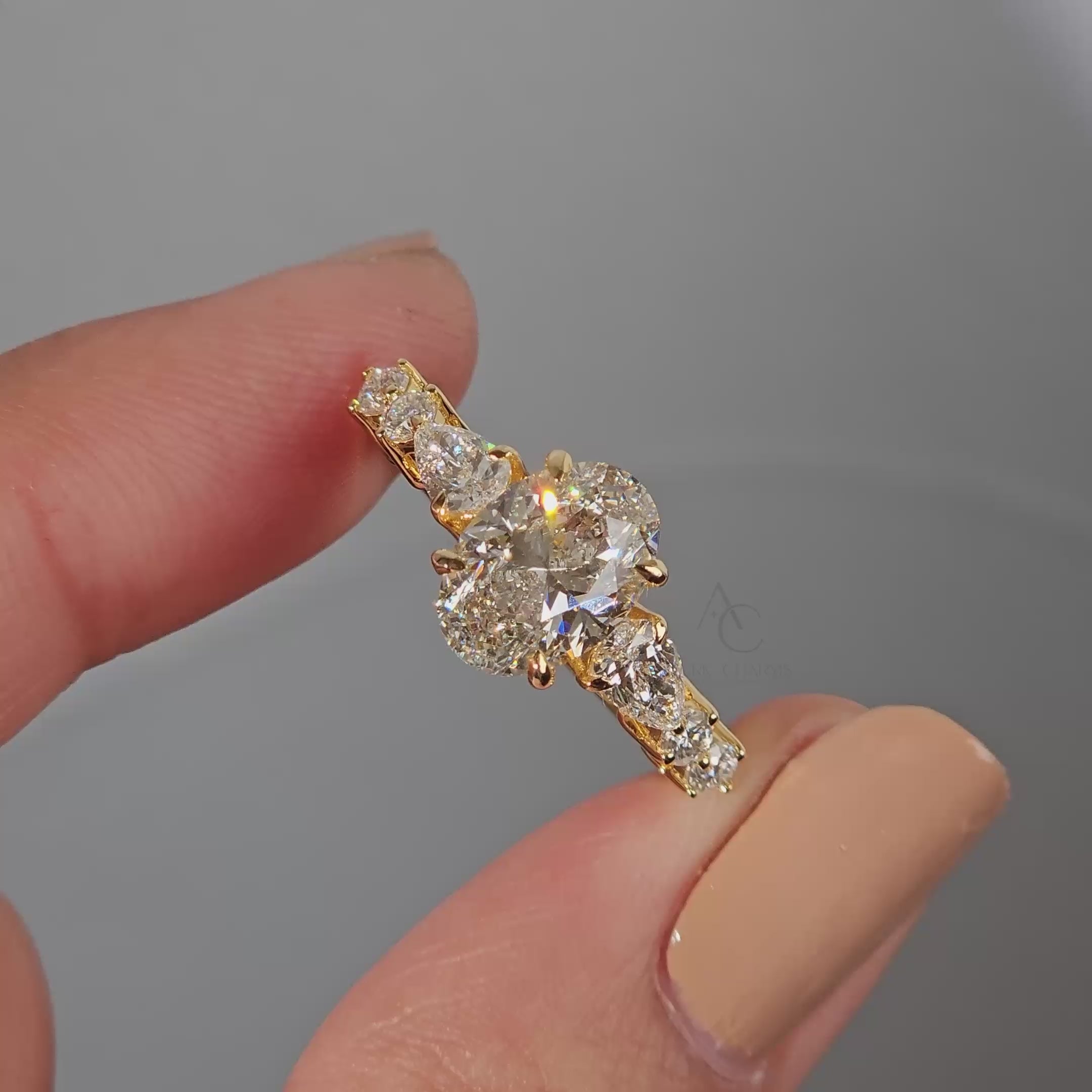 360 view of oval diamond engagement ring showcasing delicate craftsmanship and symmetry.