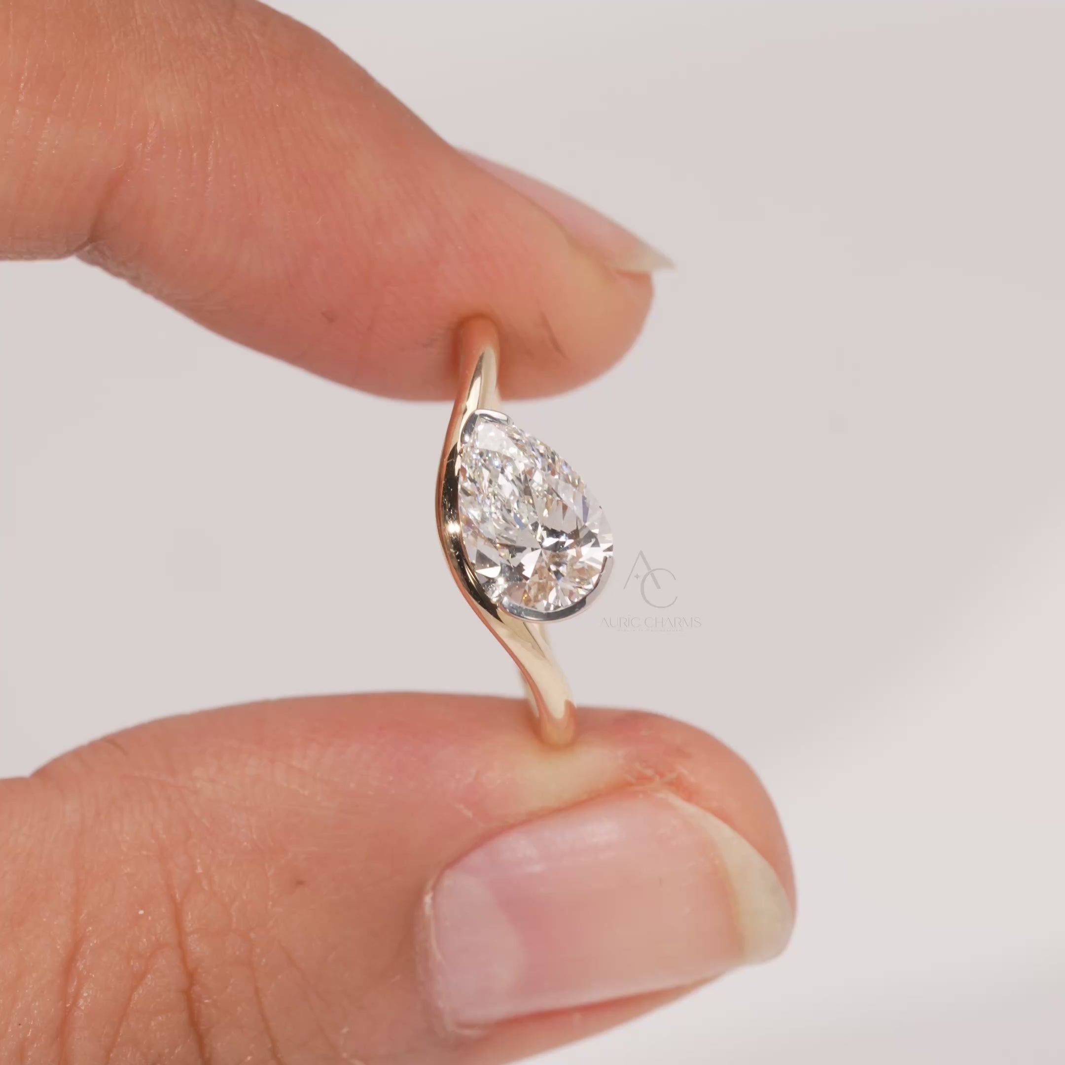 Nadia Pear Curved Solitaire Ring