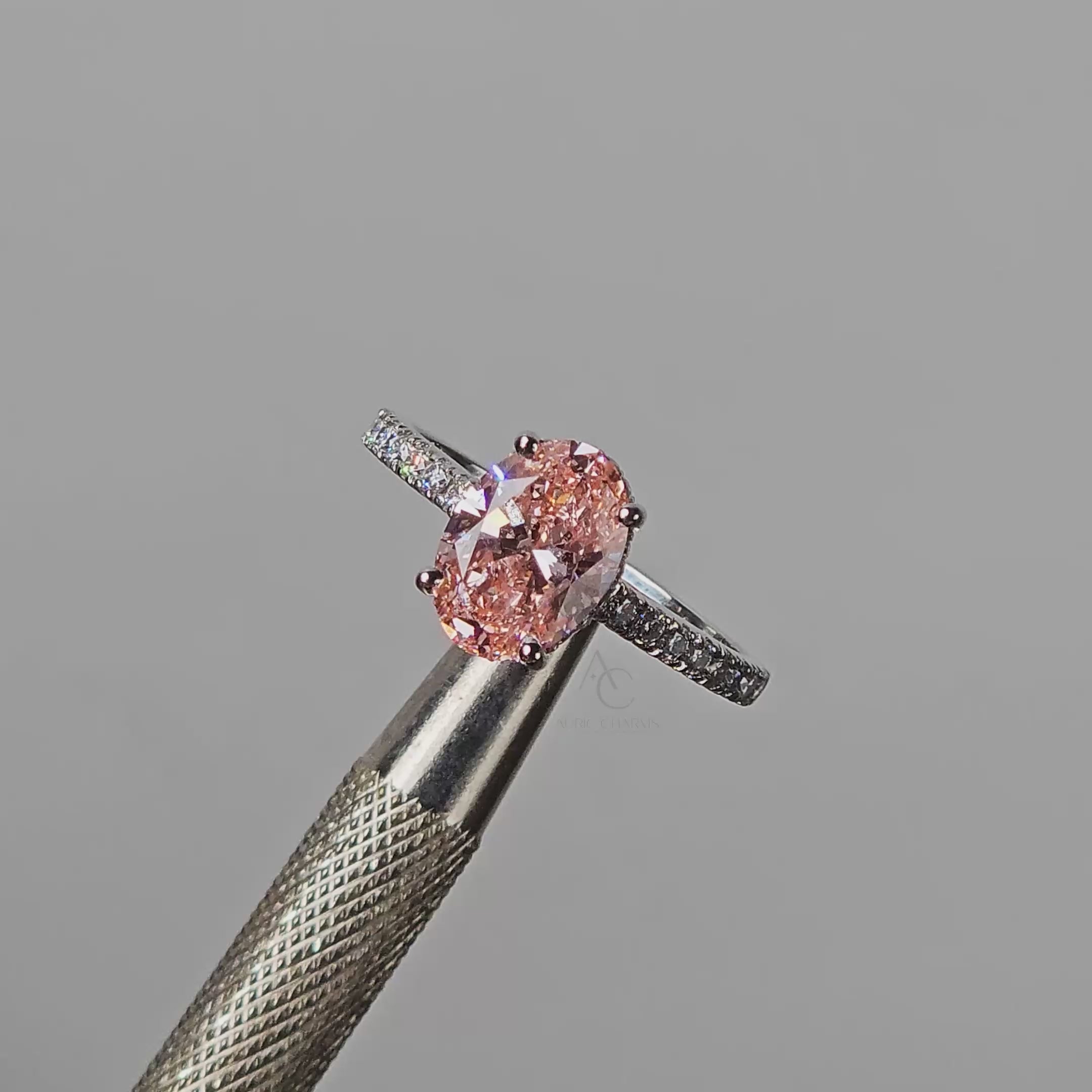 Fancy Pink Oval Hidden Halo Ring
