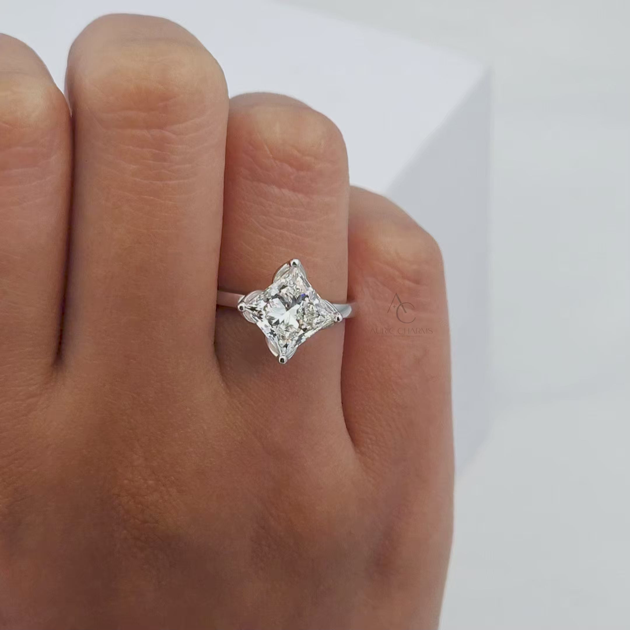 Video showcasing square-cut lab-grown diamond ring with unique floral-inspired design.