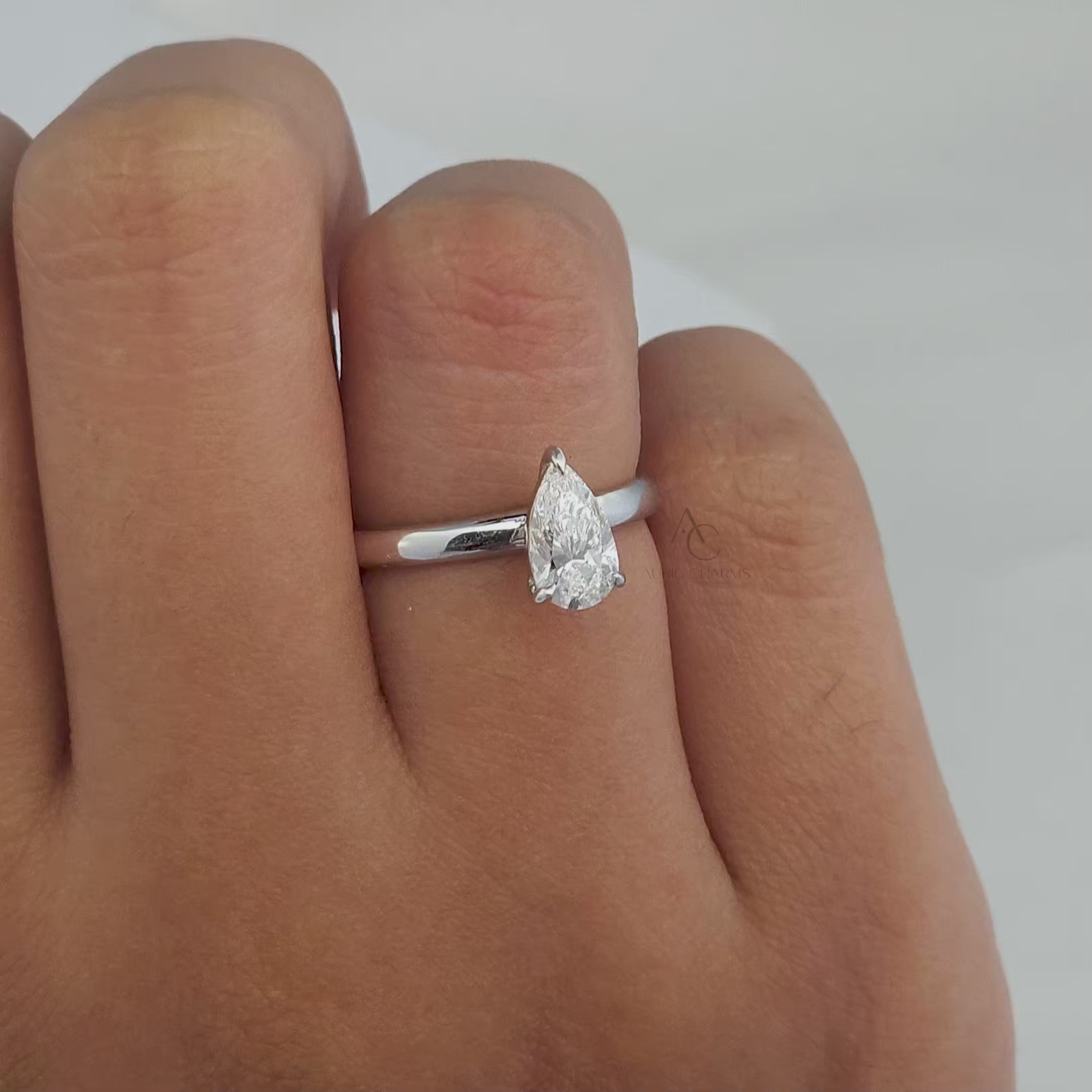Lyra Pear Cut Solitaire Diamond Ring